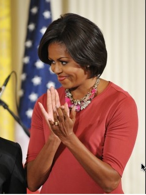 Michelle Obama Layers two necklaces